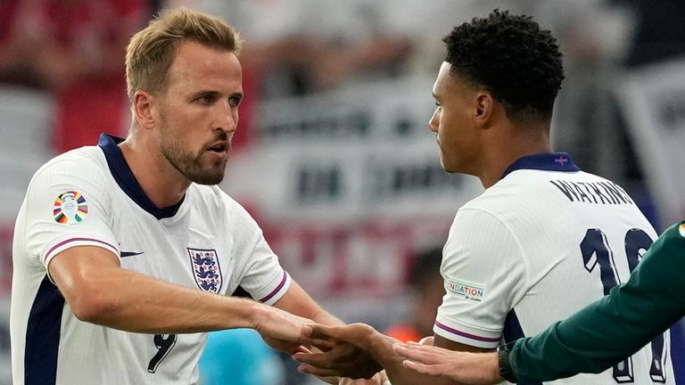 England's Harry Kane, left, substitutes out for England's Ollie Watkins during a Group C match between Denmark and England at the Euro 2024 soccer tournament in Frankfurt, Germany, Thursday, June 20, 2024. (AP Photo/Michael Probst)