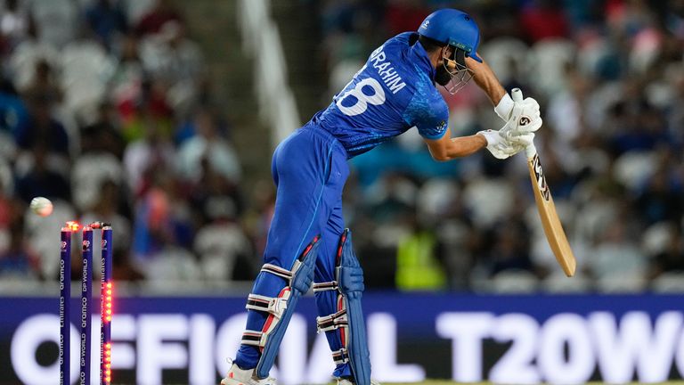Afghanistan's Ibrahim Zadran is beaten by South Africa's Kagiso Rabada in the T20 World Cup semi-finals (Associated Press)