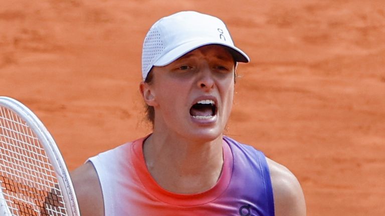 Poland's Iga Swiatek celebrates winning her semifinal match of the French Open tennis tournament against Coco Gauff of the U.S. at the Roland Garros stadium in Paris, Thursday, June 6, 2024. (AP Photo/Aurelien Morissard)