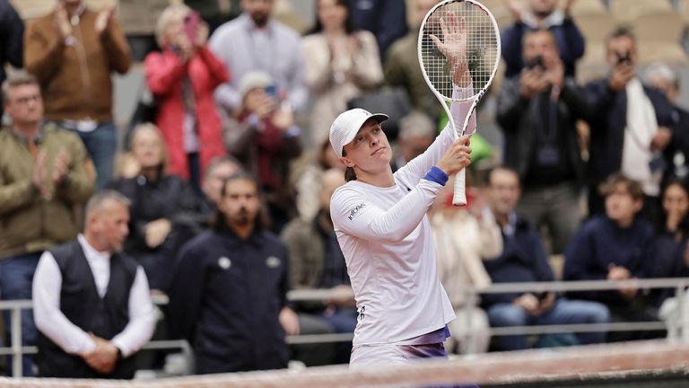 Iga Swiatek of Poland acknowledges the crowd after beating Russian Anastasia Potapova in a women's singles fourth-round match at the French Open tennis tournament in Paris on June 2, 2024. (Kyodo via AP Images) ==Kyodo