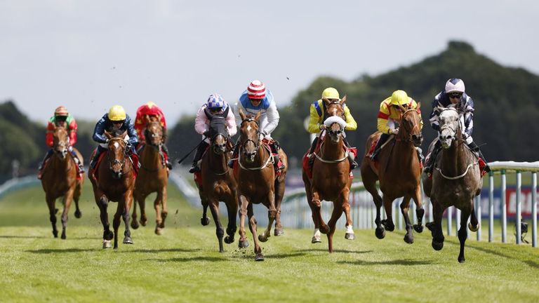 Iron Lion (right) heads for the finish