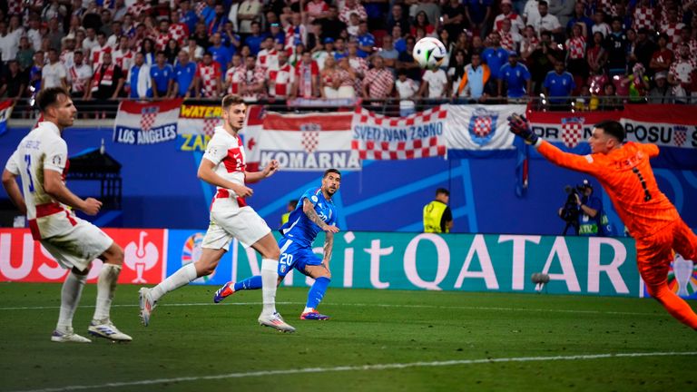 Italy's Mattia Dzacagni scores his team's first goal during the Group B match between Croatia and Italy at the Euro 2024 soccer tournament in Leipzig, Germany, Monday, June 24, 2024. (AP Photo/Petr David Josek)