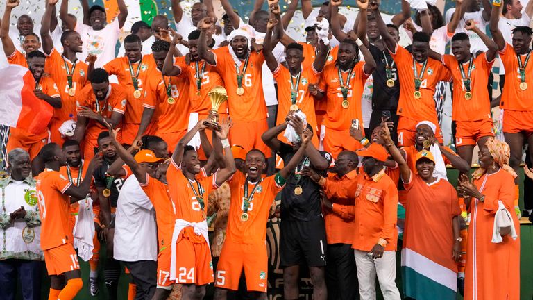 Ivory Coast players celebrate after winning the African Cup of Nations