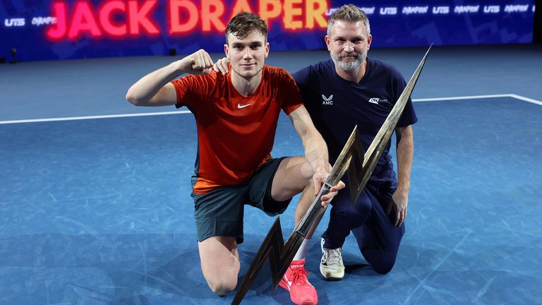 Jack Draper of Great Britain and coach James Trotman with the trophy after winning the Final match against Holger 'The Viking' Rune of Denmark during Day Three of the UTS Grand Final London at ExCel London on December 17, 2023 in London, England.  (Photo by Julian Finney/Getty Images for UTS)