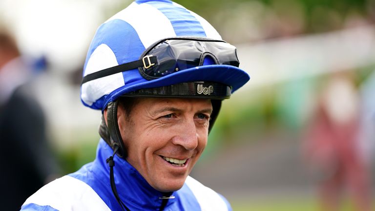Jim Crowley is all smiles as he sports his regular Shadwell colours