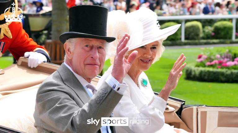 King Charles III and Queen Camilla wave to the Royal Ascot crowd