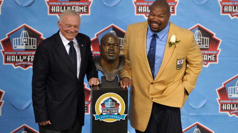 Inductee Larry Allen, right, poses with his presenter, Dallas Cowboys owner Jerry Jones, and his bust during the induction ceremony at the Pro Football Hall of Fame Saturday, Aug. 3, 2013, in Canton, Ohio. (AP Photo/David Richard)