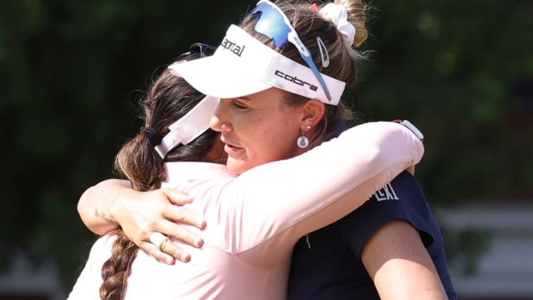 GRAND RAPIDS, MI - JUNE 16: LPGA golfer Lilia Vu hugs Lexi Thompson after making the winning putt on the 4th hole during a playoff at the LPGA Meijer LPGA Classic for Simply Give on June 16th, 2024, at Blythefield Country Club in Grand Rapids, Michigan. (Photo by Brian Spurlock/Icon Sportswire) (Icon Sportswire via AP Images)