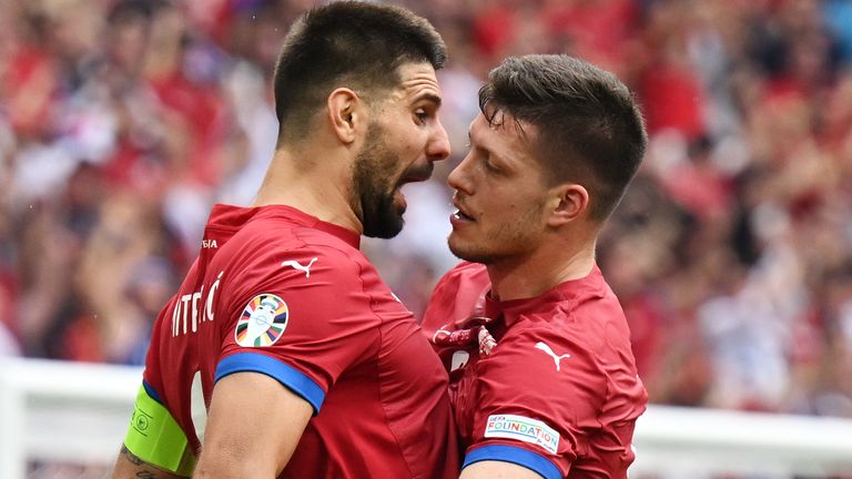 MUNICH, GERMANY - JUNE 20: Luka Jovic of Serbia celebrates scoring his team's first goal with teammate Aleksandar Mitrovic during the UEFA EURO 2024 group stage match between Slovenia and Serbia at Munich Football Arena on June 20, 2024 in Munich, Germany. (Photo by Sebastian Widmann - UEFA/UEFA via Getty Images)