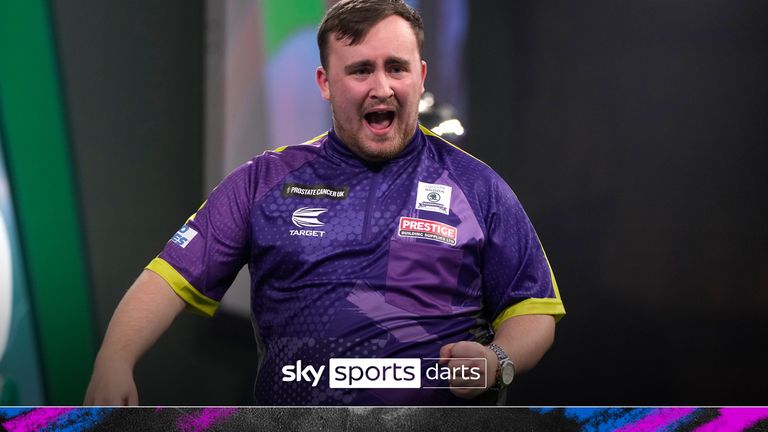 Luke Littler of England celebrates winning a set during the final match against Luke Humphries of England at the World Darts Championship, in London, Wednesday, Jan. 3, 2024. (AP Photo/Kin Cheung)