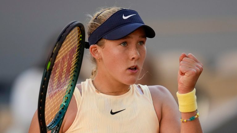 Russia's Mirra Andreeva clenches her fist after scoring a point against Aryna Sabalenka of Belarus during their quarterfinal match of the French Open tennis tournament at the Roland Garros stadium in Paris, Wednesday, June 5, 2024. (AP Photo/Christophe Ena)