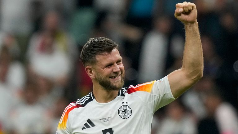 Germany's Niclas Fullkrug celebrates at the end of a Group A match between Switzerland and Germany at the Euro 2024 soccer tournament in Frankfurt, Germany, Sunday, June 23, 2024. (AP Photo/Frank Augstein)