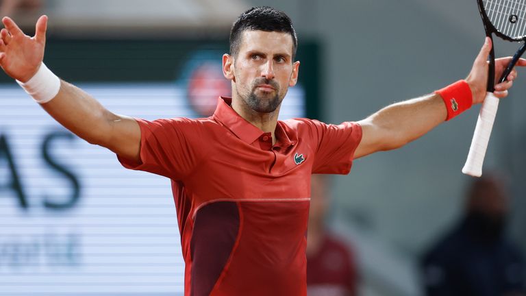 Serbia's Novak Djokovic celebrates winning his third round match of the French Open tennis tournament against Italy's Lorenzo Musetti at the Roland Garros stadium in Paris, Sunday, June 2, 2024. (AP Photo/Jean-Francois Badias)