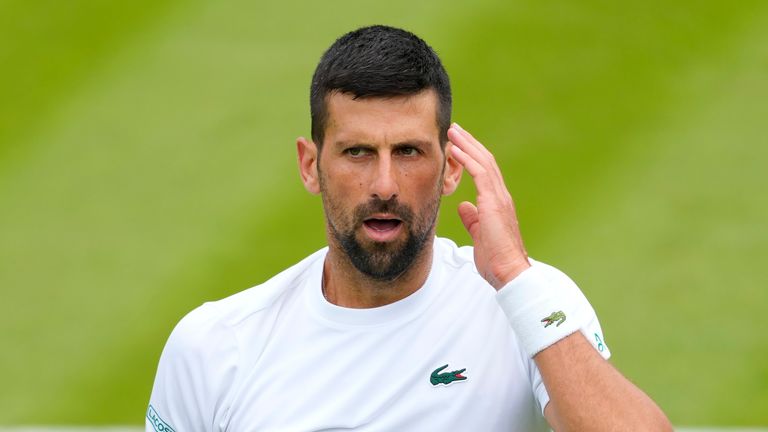 Novak Djokovic of Serbia reacts during a training session on Court 2 at the All England Lawn Tennis and Croquet Club in Wimbledon, London, Friday, June 28, 2024. The Wimbledon Championships begin on July 1. (AP Photo/Kirsty Wigglesworth)