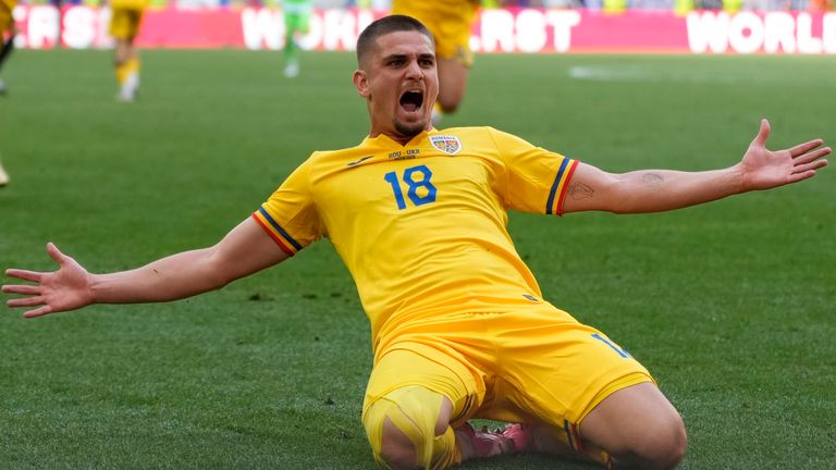 Romania's Razvan Marin celebrates scoring their second goal against Ukraine