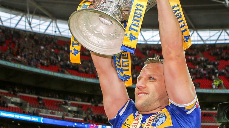 Picture by Alex Whitehead/SWpix.com - 23/08/2014 - Rugby League - Tetley's Challenge Cup Final - Castleford Tigers v Leeds Rhinos - Wembley Stadium, London, England - Leeds' Rob Burrow lifts the trophy.