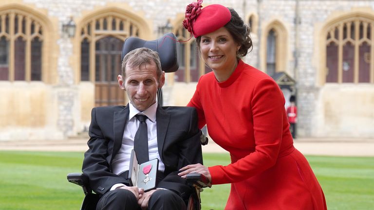 Rob Burrow with his wife Lindsey after he was made an MBE by the Princess Royal during an investiture ceremony at Windsor Castle. Picture date: Tuesday April 5, 2022.