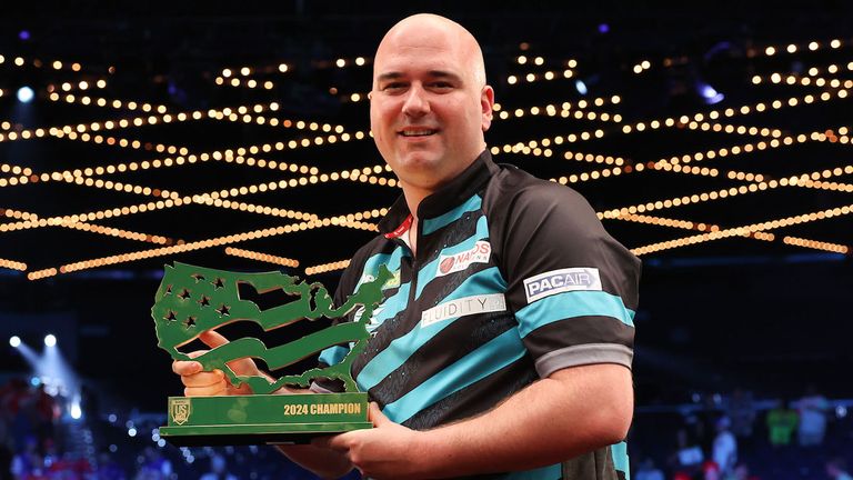 Rob Cross celebrates victory at the 2024 bet365 US Darts Masters at the Theater at Madison Square Garden in New York, NY (Matt Heasley/PDC)