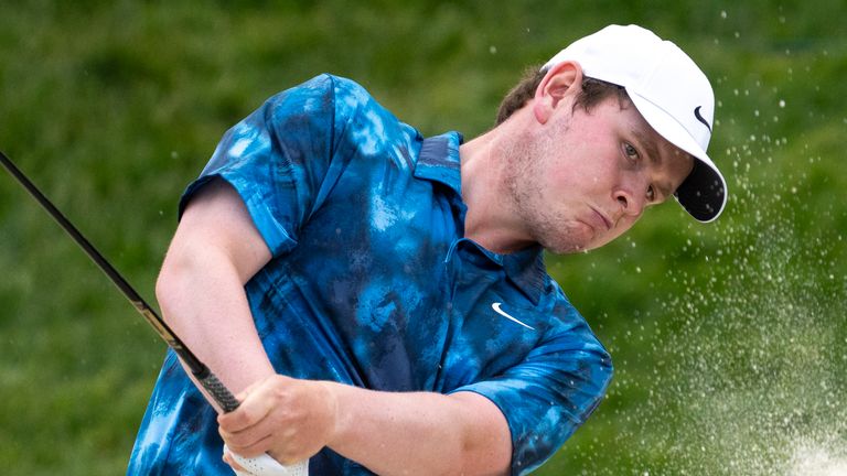 Robert MacIntyre, of Scotland, hits out of a bunker on the eighth hole during the third round of Canadian Open (Frank Gunn/The Canadian Press via AP)