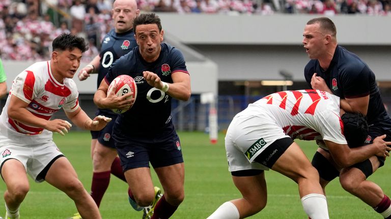 Alex Mitchell scores a try against Japan