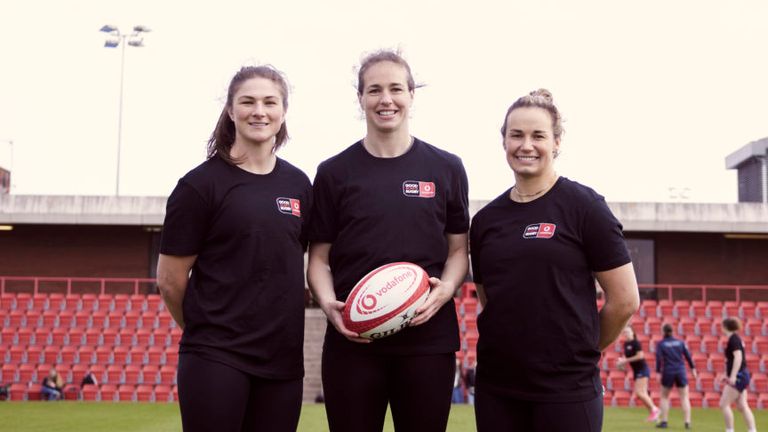 Scotland's fly half Helen Nelson (L), England's centre Emily Scarratt (M), and Natasha Hunt (R) are all part of the EmpowHER project