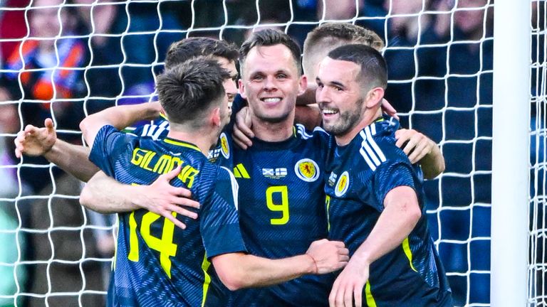 Scotland's Lawrence Shankland celebrates as he scores to make it 2-0
