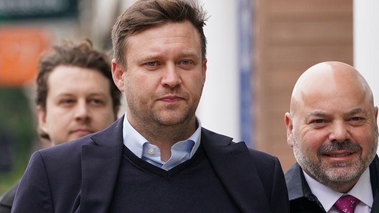 ONLY TO BE USED IN CASE OF VERDICT IN CASE: Scott Law, 43, (centre) arrives at Highbury Corner Magistrates' Court, north London, where he is accused of headbutting football pundit and former Manchester United midfielder Roy Keane, at the Emirates Stadium on September 3 last year. Picture date: Friday May 31, 2024.