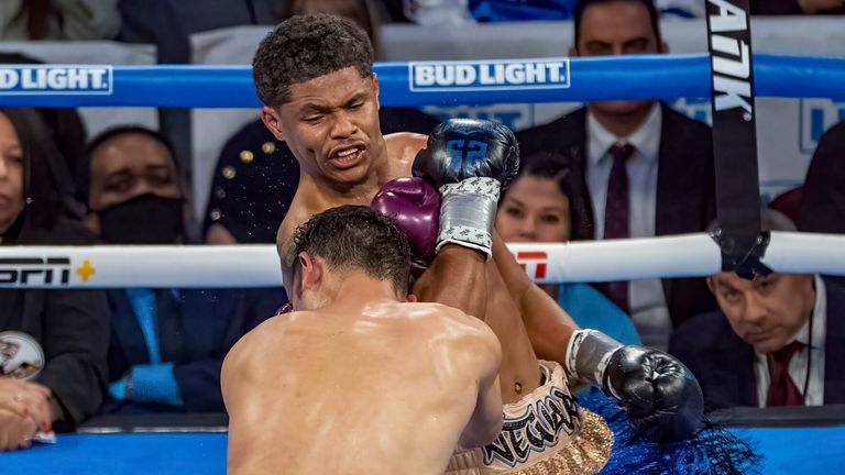 April 8, 2023, Newark, New Jersey, USA: SHAKUR STEVENSON and SHUICHIRO YOSHINO (purple and yellow trunks) fight in the WBC Lightweight Final Eliminator bout at the Prudential Center in Newark, New Jersey.  Stevenson won by technical knockout in the 6th round.  (Cal Sport Media via AP Images)