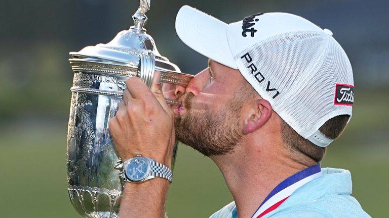 Wyndham Clark holds the trophy after winning after the U.S. Open golf tournament at Los Angeles Country Club on Sunday, June 18, 2023, in Los Angeles. (AP Photo/George Walker IV)  
