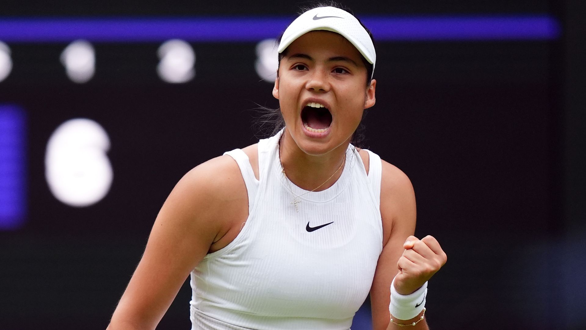 Raducanu 'wins ugly like England' to reach second round at Wimbledon