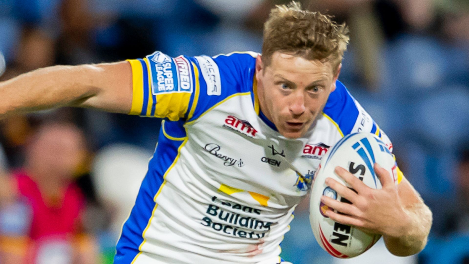 Leeds ease past Huddersfield to boost play-off hopes