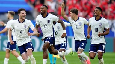 England players start the celebrations after Trent Alexander-Arnold's winning penalty