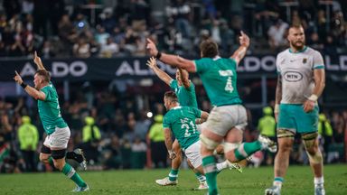 Ireland celebrate after Ciaran Frawley's last-gasp drop goal defeats South Africa in Durban