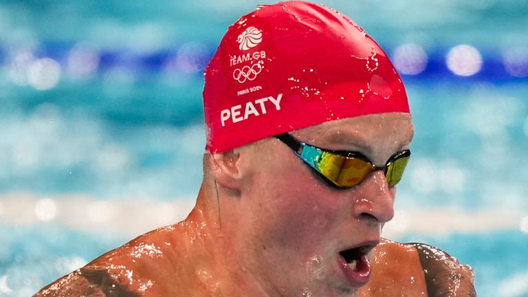 Adam Peaty, of Britain, competes in the men's 100-meter breaststroke final at the 2024 Summer Olympics, Sunday, July 28, 2024, in Nanterre, France. (AP Photo/Martin Meissner)