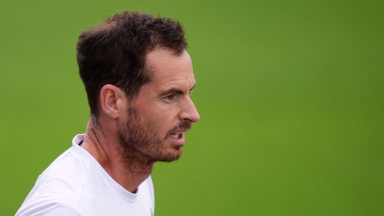 Andy Murray practised at Wimbledon ahead of his scheduled first-round match but is yet to decide on his involvement in the singles