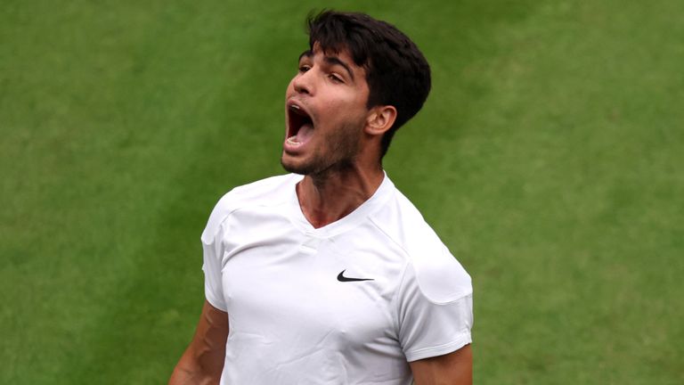 Carlos Alcaraz of Spain celebrates as he plays against Tommy Paul of United States in the Gentlemen's Singles Quarter Final match during day nine of The Championships Wimbledon 2024 at All England Lawn Tennis and Croquet Club on July 09, 2024 in London, England. (Photo by Clive Brunskill/Getty Images)