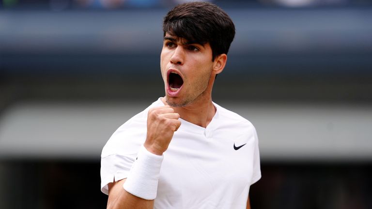 Carlos Alcaraz reacts during his match against Novak Djokovic in the Gentlemen's Singles final on day fourteen of the 2024 Wimbledon Championships at the All England Lawn Tennis and Croquet Club, London. Picture date: Sunday July 14, 2024.