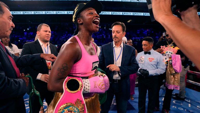 Middleweight champion Claressa Shields celebrates after defeating reigning WBC women's heavyweight boxing champion Vanessa Lepage-Joanisse of Quebec during a fight, Saturday, July 27, 2024, in Detroit. (AP Photo/Carlos Osorio)