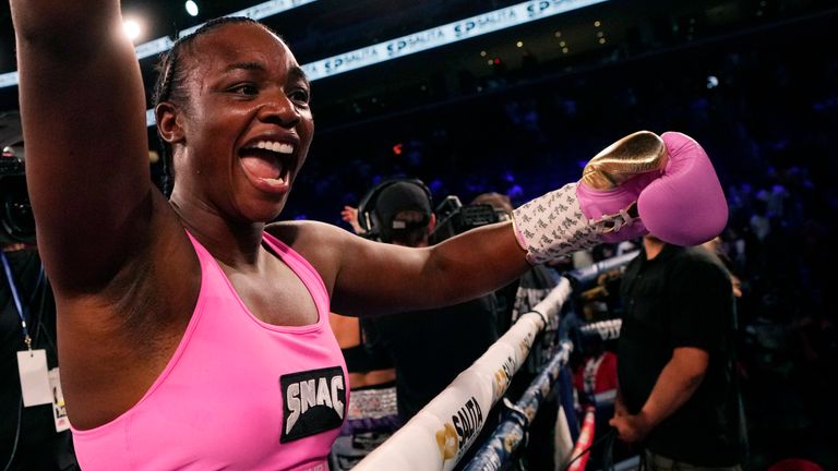 Middleweight champion Claressa Shields celebrates after defeating reigning WBC women's heavyweight boxing champion Vanessa Lepage-Joanisse of Quebec during a fight, Saturday, July 27, 2024, in Detroit. (AP Photo/Carlos Osorio)