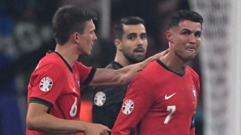 Portugal forward #07 Cristiano Ronaldo during the football match between Portugal and Slovenia during the Euro 2024 Round of 16 match at Eintracht Arena in Frankfurt am Main on July 1, 2024 (Right) Reacting to a missed penalty.