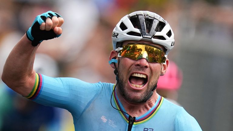Britain's sprinter Mark Cavendish crosses the finish line to win a record 35th Tour de France stage and break the record of Belgian legend Eddy Merckx in the fifth stage of the Tour de France cycling race over 177.4 kilometers (110.2 miles) with start in Saint-Jean-de-Maurienne and finish in Saint-Vulbas, France, Wednesday, July 3, 2024. (AP Photo/Daniel Cole)