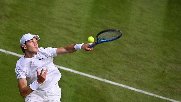 Britain's Jack Draper returns the ball to Sweden's Elias Ymer during their men's singles tennis match on the second day of the 2024 Wimbledon Championships at The All England Lawn Tennis and Croquet Club in Wimbledon, southwest London, on July 2, 2024. (Photo by ANDREJ ISAKOVIC / AFP) / RESTRICTED TO EDITORIAL USE