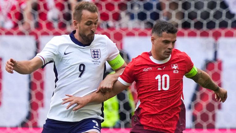 Harry Kane challenges Granit Xhaka