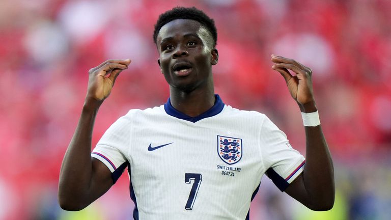 Bukayo Saka celebrates after scoring England's equaliser against Switzerland