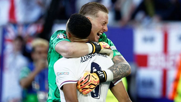 Jordan Pickford and Trent Alexander-Arnold celebrate after England defeat Switzerland on penalties