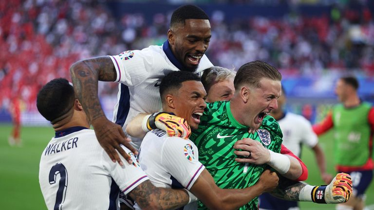 England players celebrate after defeating Switzerland on penalties to advance to the semi-finals of Euro 2024
