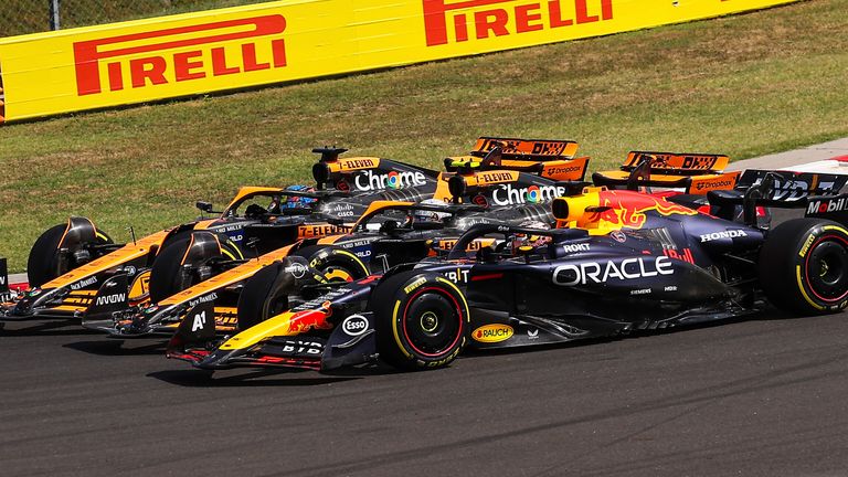 Oscar Piastri, Lando Norris and Max Verstappen at the start of the Hungarian GP