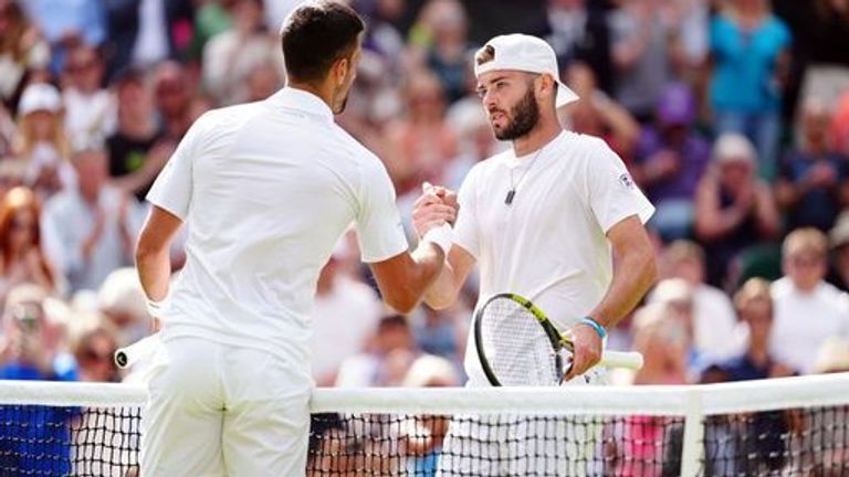 Jacob Fearnley (right) following his defeat to Novak Djokovic on day four of the 2024 Wimbledon Championships at the All England Lawn Tennis and Croquet Club, London. Picture date: Thursday July 4, 2024.