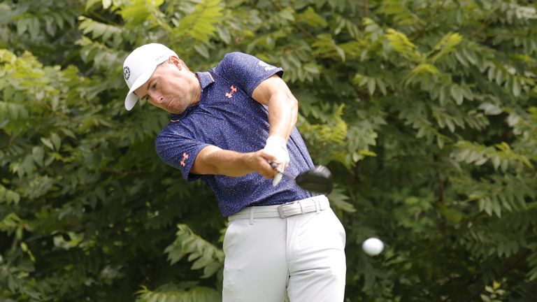 SILVIS, IL - JULY 07: PGA golfer Jordan Spieth plays his tee shot on the 2nd hole during the final round of the John Deere Classic on July 7,2024, at the TPC Deere Run in Silvis, Illinois.