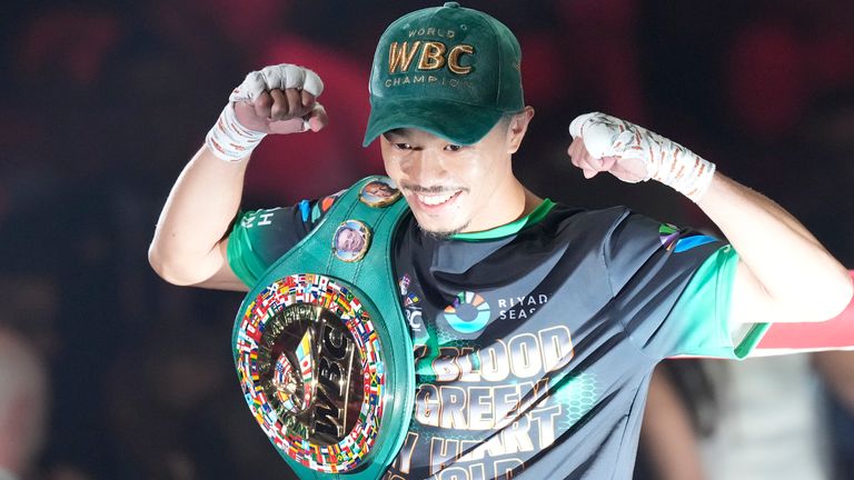 Japanese champion Junto Nakatani celebrates after defeating Filipino challenger Vincent Astrolabio in the WBC bantamweight world title boxing match in Tokyo, Saturday, July 20, 2024. (AP Photo/Hiro Komae)